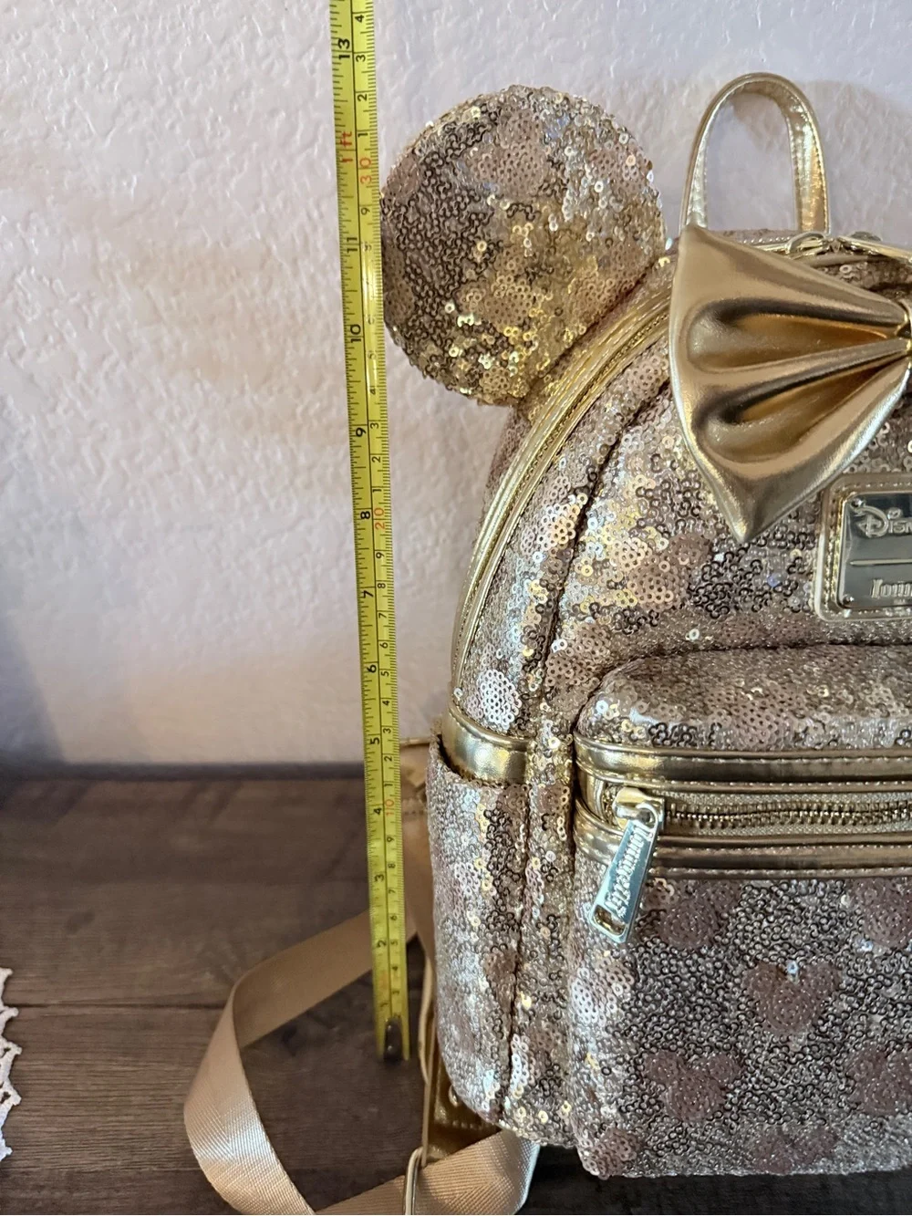 Loungefly Disney gold sequin backpack with hidden mickeys